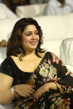 Actress Charmy Kaur In Black Saree Photos