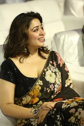 Actress Charmy Kaur In Black Saree Photos