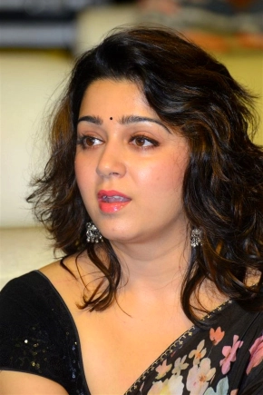 Actress Charmy Kaur In Black Saree Photos