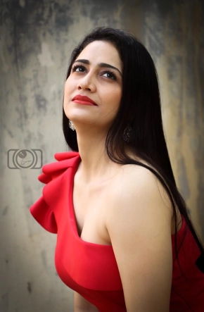 Actress Komal Sharma Stunning Look In Red Dress Photoshoots Images