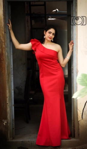 Actress Komal Sharma Stunning Look In Red Dress Photoshoots Images