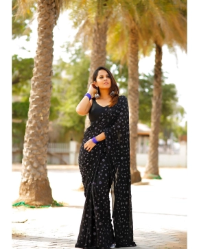 Anchor Anusuya In Black Saree Stills