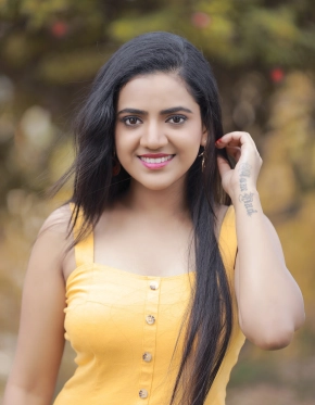 Harshitha Gowda In Yellow Dress Hot Stills