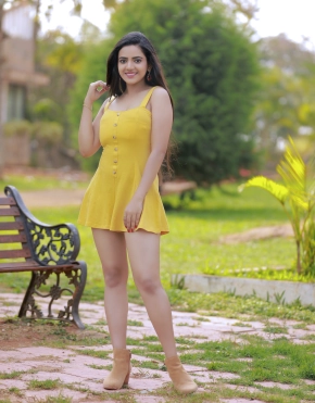 Harshitha Gowda In Yellow Dress Hot Stills