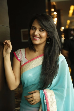 Telugu Anchor Anusuya Bharadwaj In Cyan Color Saree Stills