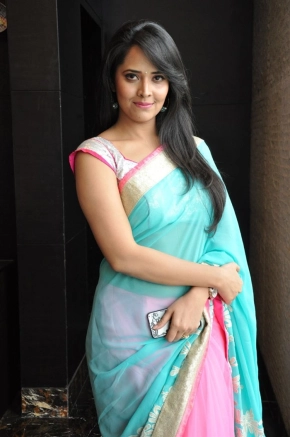 Telugu Anchor Anusuya Bharadwaj In Cyan Color Saree Stills