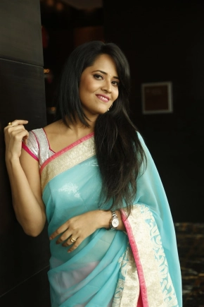 Telugu Anchor Anusuya Bharadwaj In Cyan Color Saree Stills